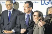  ?? AP ?? Jay Inslee (from left), Dannel Malloy and Kate Brown attend the National Governors’ Associatio­n’s winter meeting in Washington on Saturday. The governors will meet with President Donald Trump on Monday.