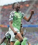  ??  ?? Nigeria’s Ahmed Musa celebrates after scoring the second of his two goals in a 2-0 World Cup victory over Iceland on Friday in Volgograd, Russia.