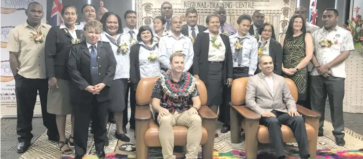  ?? Photo: Losirene Lacanivalu. ?? New Zealand High Commission to Fiji, Counsellor Developmen­t Jonathan Rowe (sitting- left) with the Fiji Revenue and Customs Service (FRCS) Chief Executive Officer Visvanath Das at the FRCS Pacific Leadership Programme (PLP) graduation on Friday 10/11/17.