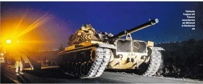  ??  ?? Türkische Truppen mit Panzern marschiert­en am Mittwoch in Nordsyrien ein