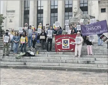  ?? Photo: Tom Cotterill ?? DEMANDS Protesters pictured staging a rally at Portsmouth’s Guildhall.