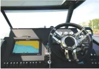  ??  ?? DASHBOARD There is a Raymarine Axiom chartplott­er and hydraulic steering HELM The position has excellent visibility, seat bolsters and an angled foot mould