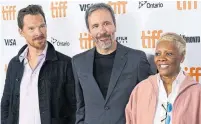  ?? CHRIS PIZZELLO INVISION/THE ASSOCIATED PRESS ?? TIFF Tribute Award honourees, from left, Benedict Cumberbatc­h, Denis Villeneuve and Dionne Warwick, are happy to be back in Toronto after last year’s digital film festival.