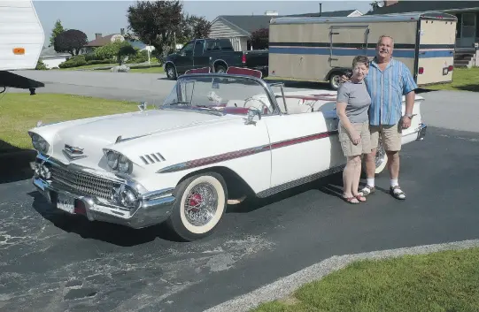  ?? PHOTOS: ALYN EDWARDS ?? Hilmar Hahn’s 1958 Chevy Impala is one of the cars columnist Alyn Edwards’s trailer has hauled. The trailer, seen in the background, was stolen earlier this year.