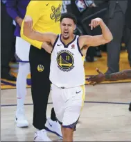  ?? AFP ?? Klay Thompson of the Golden State Warriors reacts after scoring against the Houston Rockets on Saturday.