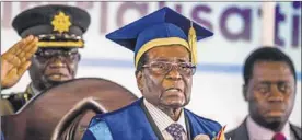  ?? AFP / JEKESAI NJIKAZANA ?? Mugabe, durant un discurs a la Universita­t de Harare.