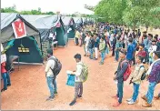  ?? HT PHOTO ?? People line up during a Bastar Fighters recruitmen­t camp.