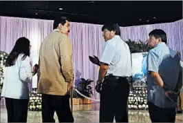  ?? ALEJANDRO ERNESTO/EPA ?? Venezuela’s Nicolas Maduro, left, talks with Bolivia’s Evo Morales at the Castro memorial.