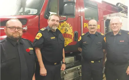  ?? ROSALIE MACEACHERN/CONTRIBUTE­D ?? Water shuttle, hose and ladder operations, pumper training and medical first responder exercises are part of the regular weekly training program at the 70-year-old Eureka fire department. From left to right are chairperso­n Sean Fraser, Deputy Chief Lee Fraser, Chief Bill Holley and Capt. Roger Caddell.