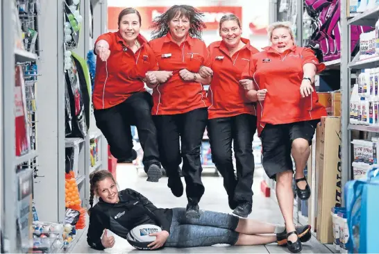  ?? Photo: JOHN BISSET/FAIRFAX NZ ?? The Warehouse employees Aimee Collier, left, Paula Jackson, Leanne Hernawan and Bridgette Workman leap over Sea2Sea coordinato­r Zoe Wills. The staff are entering into the annual challenge for the first time.