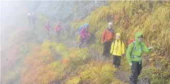  ??  ?? Participan­ts on a Kanto Adventures trip on Hakkai-san in Niigata Prefecture