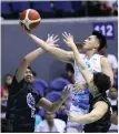 ?? PBA PHOTO ?? RIGHT ON TIME!
Javee Mocon of Phoenix goes for a layup against Terrafirma defenders during the 022-23 PBA Governors’ Cup on Saturday, Feb. 18, 2023, at the Araneta Coliseum.