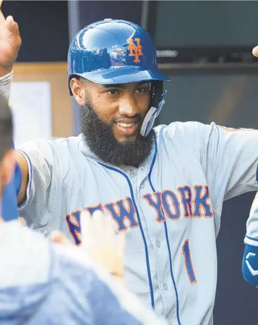  ?? GETTY ?? Amed Rosario continues his hot-hitting second half, going 5 for 6 on Thursday, raising his batting average to .289 in win over Braves.