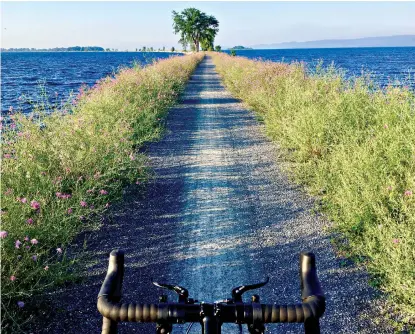  ?? Island Line Images ?? ABOVE:
Lake Champlain
Causeway in Vermont is part of the 3,000-mile East Coast Greenway.