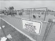  ?? JASON KRYK ?? The accessible playground area near the Vollmer Complex in LaSalle has been closed because of concerns over the uneven rubber surface.