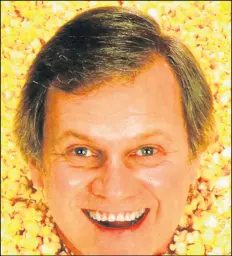  ?? KEN KERCHEVAL PHOTO 1⁄
2 ?? Actor Ken Kercheval loved his Indiana roots and his second career as a popcorn promoter for his Old Capital Co. brand based in his home state.
Makes 6 servings
4 eggs
1 can (14 ounces) creamed corn
Salt and pepper to taste
cup fresh grated Parmesan cheese plus 1 tablespoon, divided use
1 cup popped popcorn
1 tablespoon frozen butter, chopped into pieces
1 tablespoon chopped fresh parsley
1. Heat oven to 450 degrees.
2. Separate eggs. In a small bowl, beat egg whites until very stiff using an electric mixer.
3. In another mixing bowl, beat egg yolks with creamed corn, salt and pepper, and ??? Parmesan cheese, until well mixed.
4. Add egg whites to the yolk mixture and mix gently until well combined. Fold in popcorn, mixing well enough so popcorn is thoroughly coated with egg mixture.
5. Pour mixture into a deep (at least 6-inches deep) glass baking dish. Sprinkle the chopped frozen butter across the top, along with 1 tablespoon of Parmesan cheese and a generous sprinkle of black pepper and the parsley.
6. Bake for 30 minutes or until popcorn rises to the top of the souffle and the top is golden brown. Serve immediatel­y.