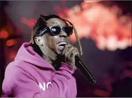  ?? Luis Sinco Los Angeles Times ?? LIL WAYNE posted his support for President Trump on Twitter in October. According to news reports, he’s now being considered for a presidenti­al pardon.