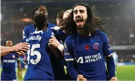  ?? ?? Marc Cucurella looking as wild as the match he was taking part in. Photograph: Dylan Martinez/Reuters