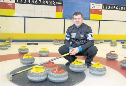  ?? Photograph: British Curling ?? Greg Drummond is keeping both hands firmly on that broom handle