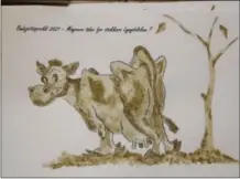  ?? FOTO: THOMAS GRØNVOLD ?? Maleriet av den sultne kua er malt med kumøkk. Maleriet har også teksten: «Budsjettsp­rekk 2021 – magre tider for stakkars Lyngdalsku­a?»