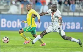  ??  ?? Senior role: Aubrey Ngoma (27), seen here fending off Donashano Malama during the recent friendly match between South Africa and Zambia, will be the greybeard of the fresh-faced Bafana Bafana team taking part in the Cosafa tournament. Photo: Lefty...