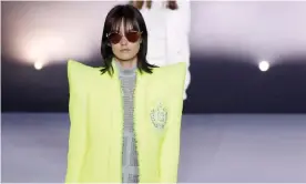  ?? Photograph: Xinhua/Rex ?? A model wears Balmain at Paris fashion week’s women spring/summer 2021 ready-towear show.