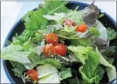  ??  ?? The mix of salad greens and tomatoes are fresh fromthe farm. A diet filledwith nutritious and healthy food can help lower the risk for heart disease.