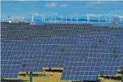  ?? AP PHOTO/ALVARO BARRIENTOS ?? Solar panels line a plateau in 2023 near the small town of Milagro in northern Spain.