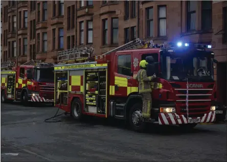  ??  ?? Fire crews rushed to Southcroft Street in Govan following a flat fire