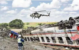  ?? —AFP PHOTO ?? OFFTRACK A helicopter flies over the site where a train derailed at Corlu district in Tekirdag, Turkey, on July 9.