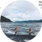  ??  ?? Rachel and Caitlin going for a dip in 4-degree water at Loch Ness.