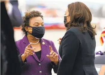  ?? JACQUELYN MARTIN AP ?? Vice President Kamala Harris talks with Rep. Barbara Lee, D-Oakland. Lee’s H.R. 256 to repeal the Authorizat­ion for Use of Military Force Against Iraq Resolution of 2002 was passed in the House Thursday, 268-161.