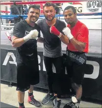  ?? Picture: FILE ?? GREAT STAR TURN: Chris van Heerden mingles with the best boxers in US as seen here with Victor Ortiz and Shane Mosley