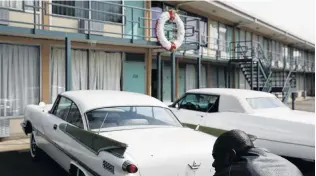  ?? PHOTO: REUTERS ?? A man sits outside the Lorraine Motel, in Memphis, where Martin Luther King jun stayed before he was shot and killed in 1968. The motel is now part of the National Civil Rights Museum.