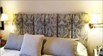  ?? Meadeworth Interiors ?? The Keegan headboard was custom-made by Meadeworth Interiors using channel tufting and Lee Jofa fabric.