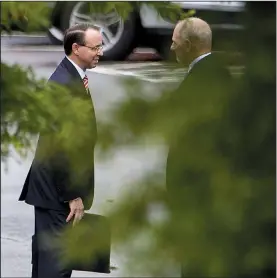  ?? The New York Times/TOM BRENNER ?? Deputy Attorney General Rod Rosenstein (left) meets with White House Chief of Staff John Kelly on Monday outside the West Wing of the White House in Washington.