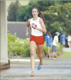  ?? The Maui News file photo ?? Seabury Hall’s Dakota Grossman competes during an MIL cross country race on Oct. 5, 2013.