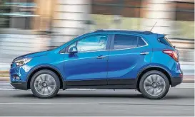  ?? Buick photos ?? For 2017, the Buick Encore has been freshened with new exterior styling that includes headlights with LED accents, a new hood and front fenders, as well as a rear spoiler and 18-inch alloy wheels on some trim levels.