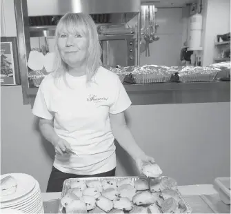  ??  ?? Holly Boettcher of the Fairmont Empress prepares a batch of the hotel’s signature scones.