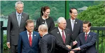  ?? PHOTO: REUTERS ?? A photo call at the Apec Summit in Danang, Vietnam, in November 2017. Front, from left: South Korea President Moon Jae In, Russia President Vladimir Putin, Malaysia Prime Minister Najib Razak, Mexico President Enrique Pena Nieto. Back, from left:...