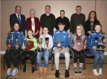  ??  ?? At the Bree AC awards night in Bree Community Centre were, front: Sophie Codd (U17), Jayden Kenny (U10), Leah Bolger (10), Darra Casey (Athlete of the Year), Olivia Howe (U19) and Abbie Doyle (U13). Back: Paul Kehoe, Chare Doyle (secretary), William Spratt-Murphy (chairman), Fr. Billy Caulfield, Pat O’Leary and Breda Cahill.