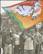  ?? PTI ?? Supporters of the BJP celebrate the party's victory in Gandhinaga­r on Monday