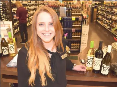  ?? STEVE MacNAULL/The Okanagan Weekend ?? Karine Sylvestre, Bench 1775’s hospitalit­y and events manager, poured samples of the Naramata winery’s vintages this week at the Save-On Foods store in Kelowna’s Orchard Plaza.