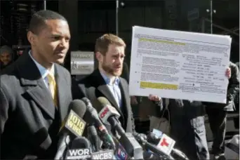  ?? RICHARD DREW — THE ASSOCIATED PRESS ?? New York City Council Member Ritchie Torres, left, and Housing Rights Initiative Executive Director Aaron Carr address a news conference outside Kushner Companies headquarte­rs, in New York, Monday.