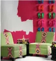  ??  ?? In the pink: Brompton chairs in Cruz Cactus from AndrewMart­in.co.uk and (below) Nuevo wallpaper from Scion