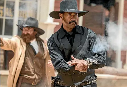  ??  ?? Denzel Washington stays well within his comfort-zone in playing a gunslinger in The Magnificen­t Seven.
