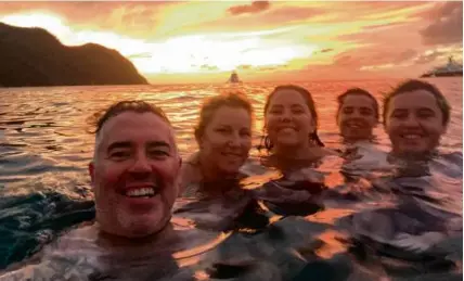  ?? ?? Ed Robertson and family on a sailboat diving trip in the Grenadines.