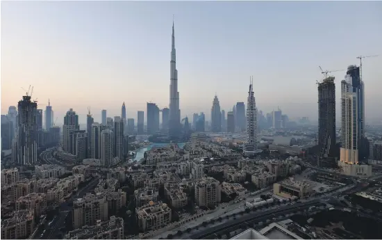  ?? AFP ?? Dubai has introduced initiative­s to boost the ease of doing business and encourage foreign investment­s