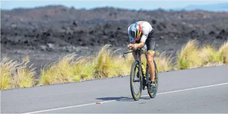  ?? FOTO: SEAN M. HAFFEY/AFP ?? Sebastian Kienle will trotz der enorm hohen Kosten beim Ironman auf Hawaii starten.