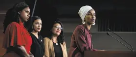  ?? Anna Moneymaker / New York Times ?? Reps. Ayanna Pressley (left), Alexandria OcasioCort­eza and Rashida Tlaib listen as Ilhan Omar speaks at a news conference on the president’s remarks.